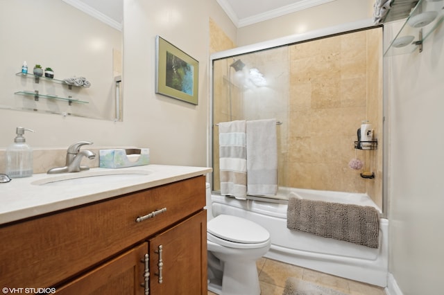 full bathroom featuring toilet, tile patterned floors, crown molding, and enclosed tub / shower combo