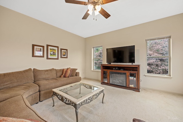 living room with carpet and ceiling fan