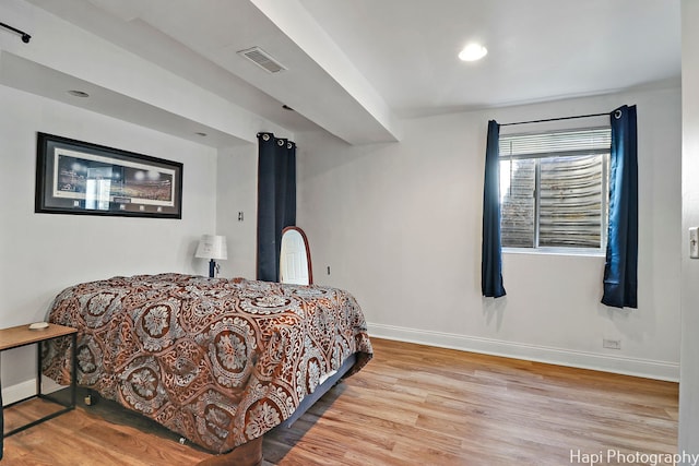 bedroom with light wood-type flooring