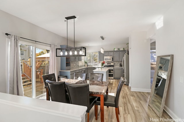 dining area with light hardwood / wood-style flooring