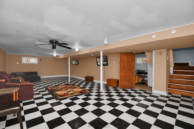 basement with ceiling fan