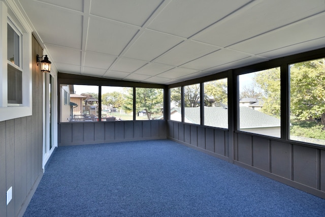 unfurnished sunroom with a healthy amount of sunlight