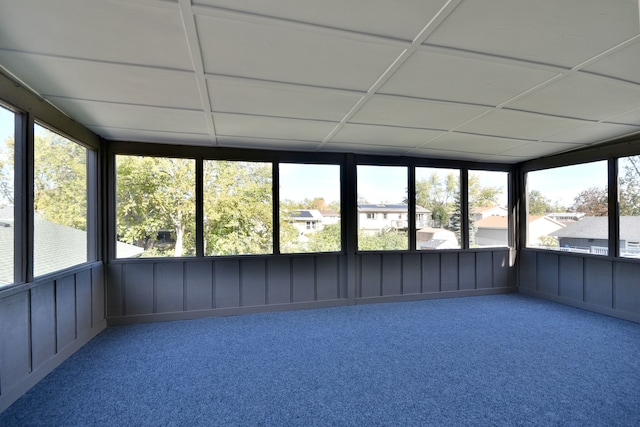 unfurnished sunroom with a healthy amount of sunlight