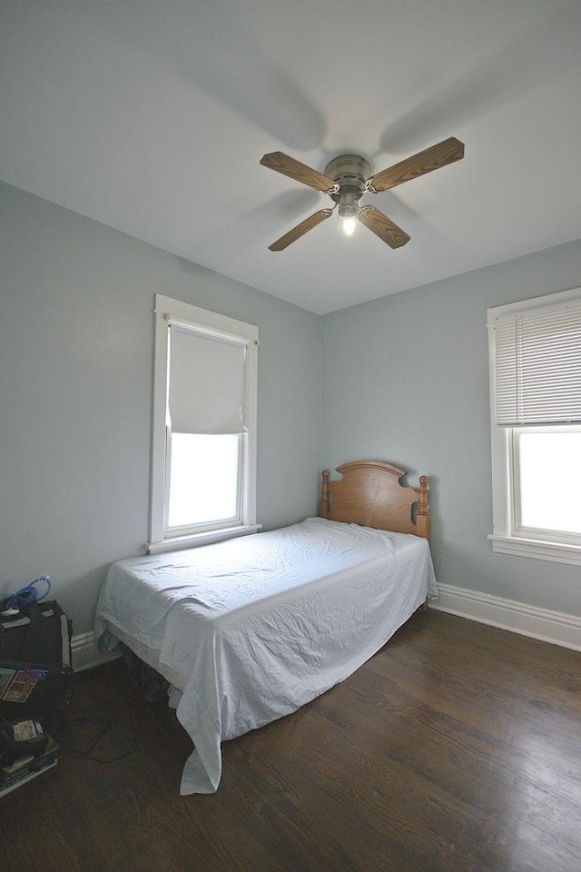 280A W Exchange St, Crete, IL 60417 - bedroom featuring baseboards, wood finished floors, and a ceiling fan