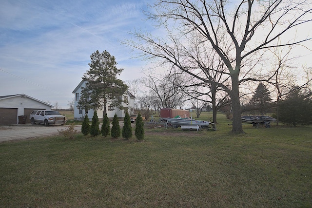 280A W Exchange St, Crete, IL 60417 - view of green lawn with an outdoor structure and a detached garage