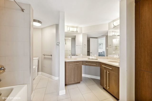 bathroom with tile patterned floors, vanity, and bathtub / shower combination