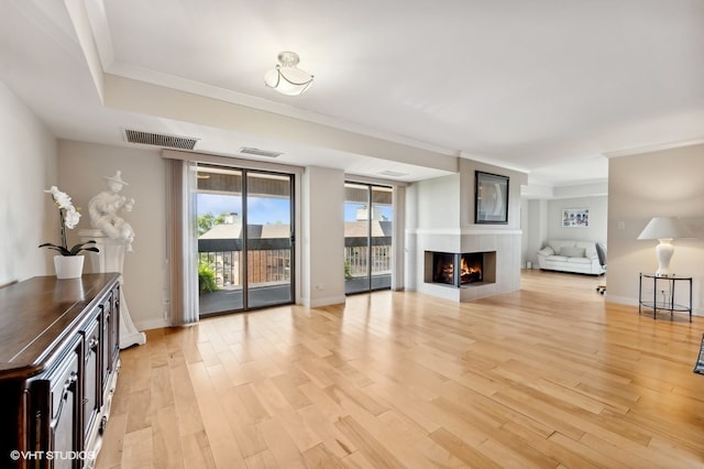 unfurnished living room featuring light wood-type flooring