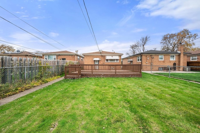 view of yard featuring a wooden deck