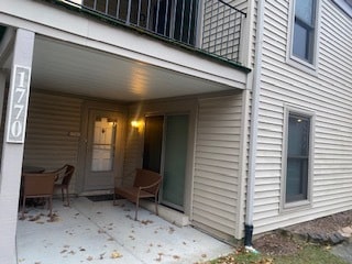 entrance to property featuring a patio area