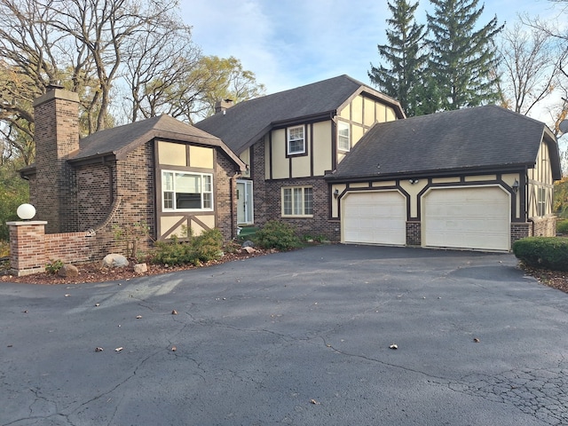 tudor home with a garage