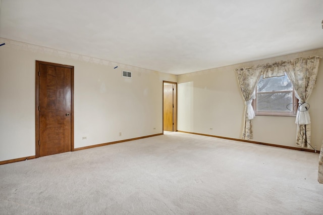 view of carpeted spare room