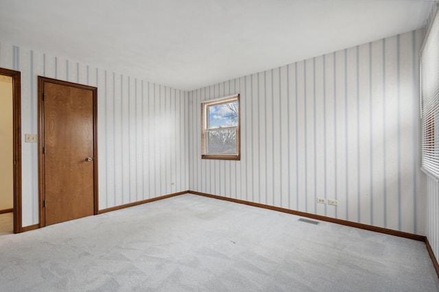 view of carpeted spare room