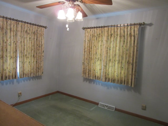 unfurnished room with carpet flooring