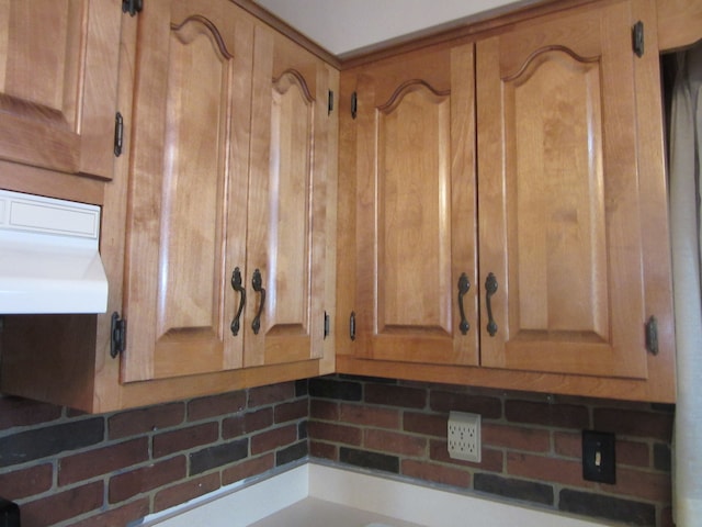 interior details featuring backsplash