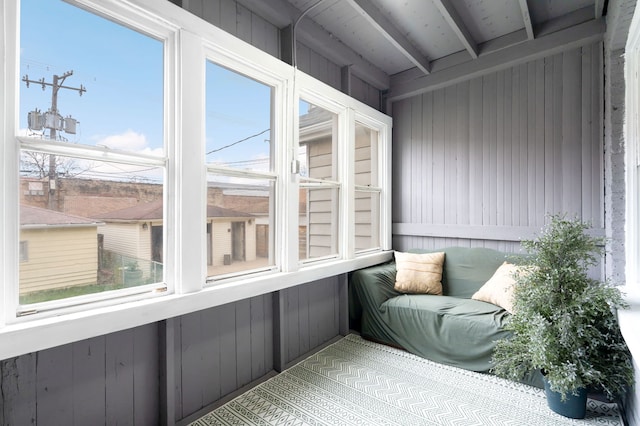 sunroom / solarium with beamed ceiling