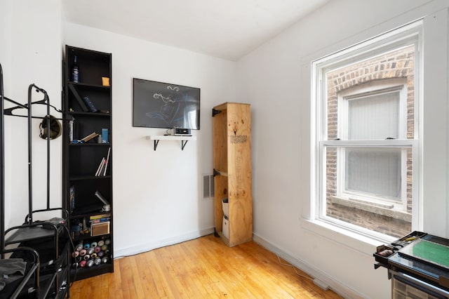 interior space with hardwood / wood-style flooring