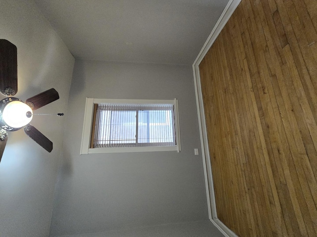 unfurnished room with ceiling fan