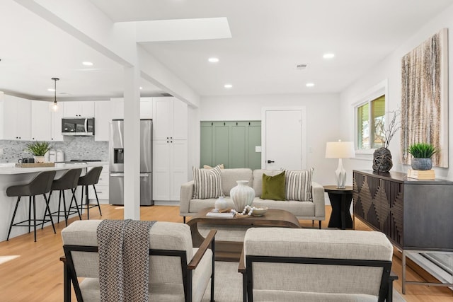 living room with light wood-type flooring