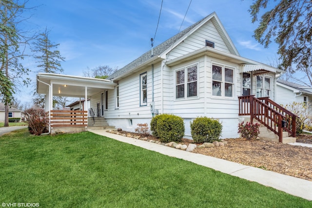 bungalow-style house with a front yard and a porch