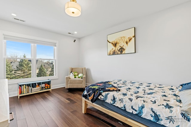 bedroom featuring dark wood-type flooring