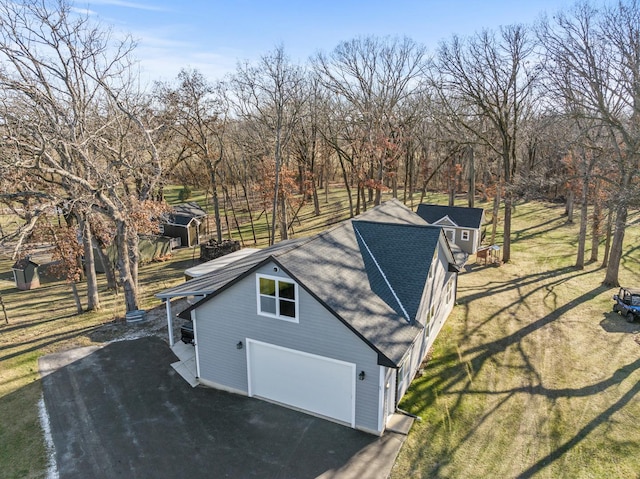 view of home's exterior with a garage