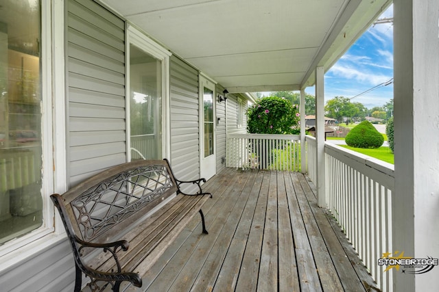 wooden terrace with covered porch