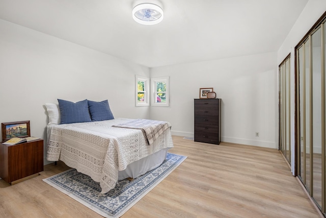 bedroom featuring light wood-type flooring