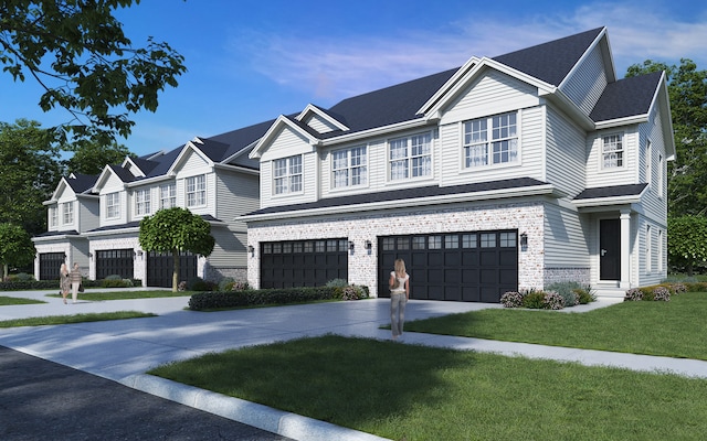 view of front facade featuring a front yard, concrete driveway, and an attached garage