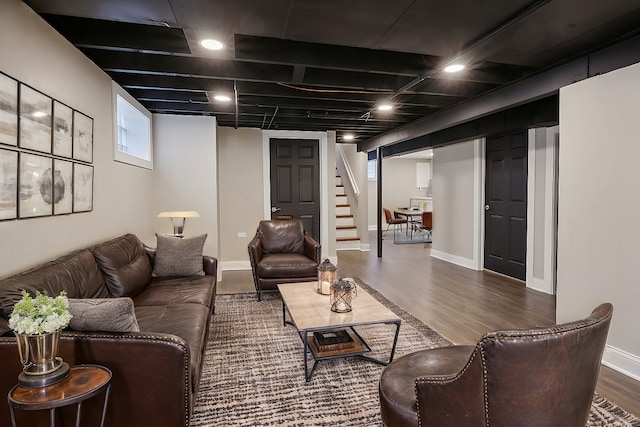 living room featuring dark hardwood / wood-style floors