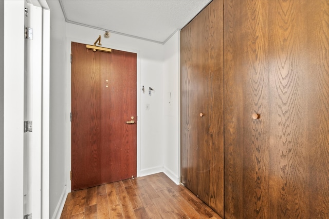 hall with light wood-type flooring