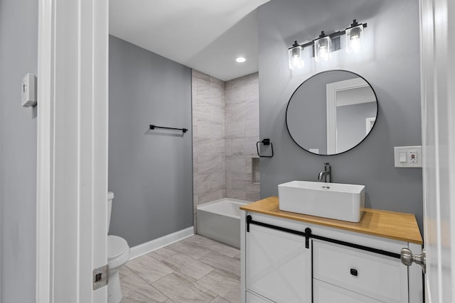 full bathroom featuring vanity, toilet, and shower / tub combination