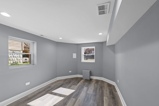 basement featuring dark wood-type flooring