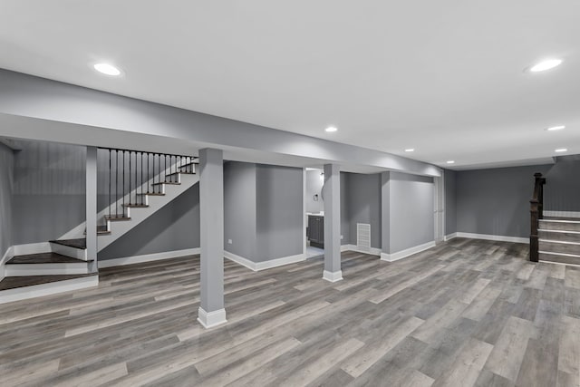 basement with wood-type flooring