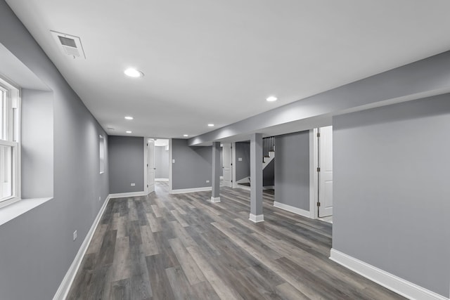 basement featuring dark wood-type flooring