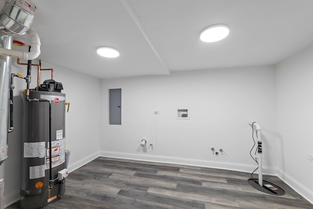 washroom featuring washer hookup, dark hardwood / wood-style flooring, gas water heater, gas dryer hookup, and electric panel