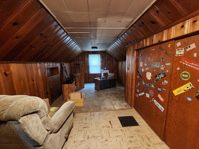 bonus room with light colored carpet, vaulted ceiling, and wood walls