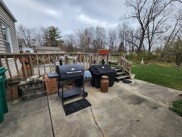 view of patio with a playground and area for grilling