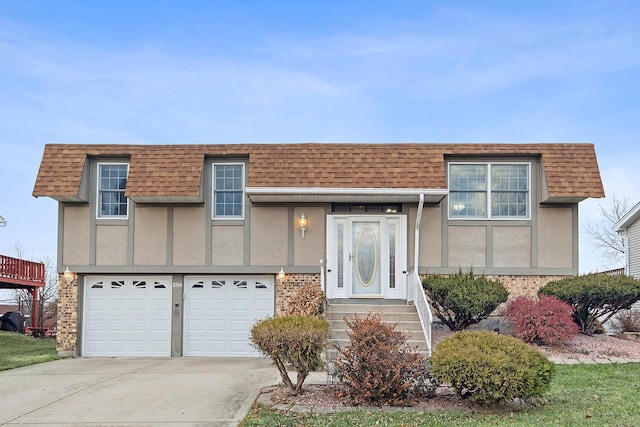 view of front of home with a garage