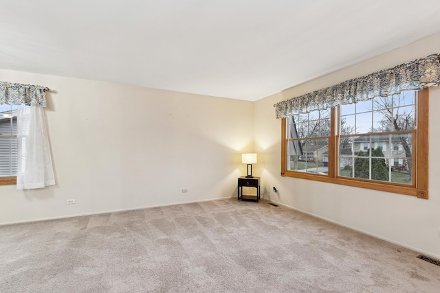 view of carpeted spare room