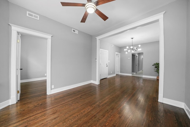 unfurnished living room featuring ceiling fan with notable chandelier and dark hardwood / wood-style flooring