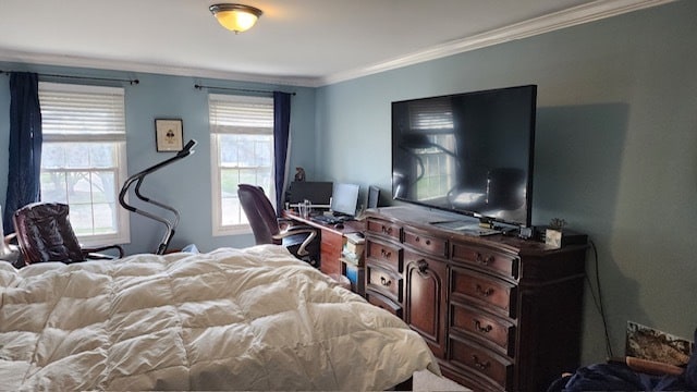 bedroom featuring crown molding