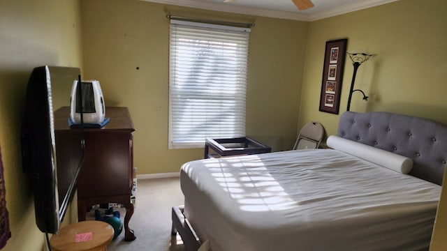 bedroom featuring ceiling fan, light colored carpet, ornamental molding, and multiple windows