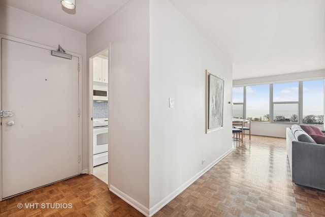 hallway with parquet floors