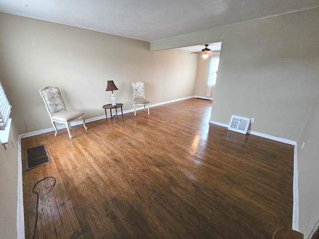 unfurnished room featuring dark hardwood / wood-style flooring