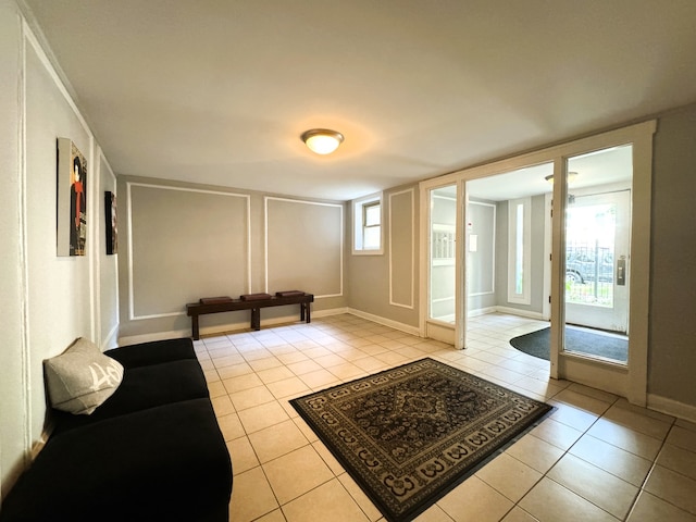 tiled living room with plenty of natural light