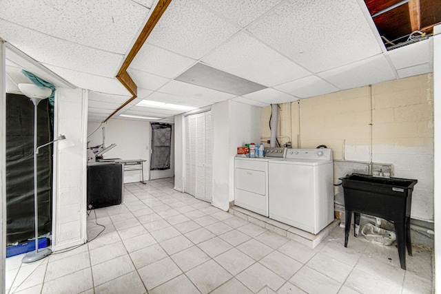 laundry area with independent washer and dryer