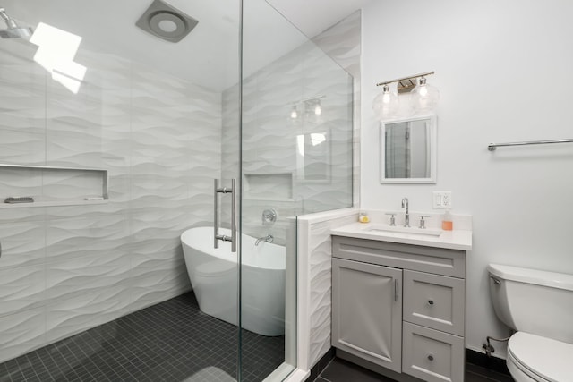 full bathroom featuring tile patterned flooring, vanity, toilet, and independent shower and bath