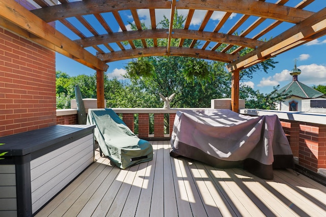 wooden terrace with a pergola