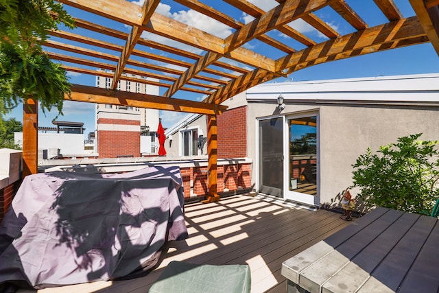 deck featuring a pergola