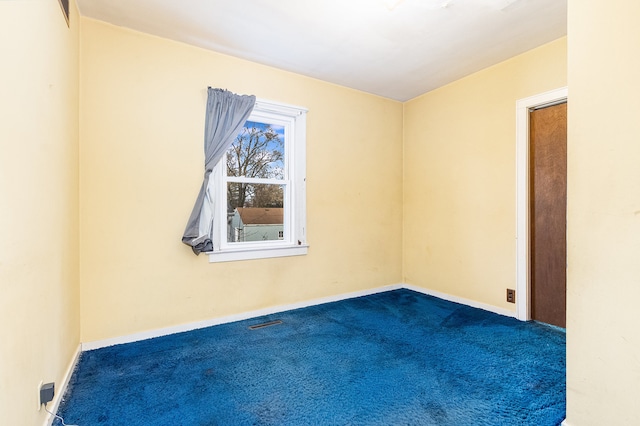 empty room with carpet floors